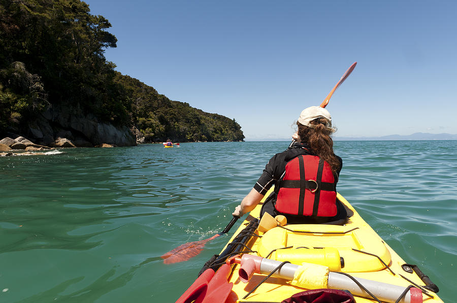 Kayaking in the Abel Tasman Photograph by Dchadwick