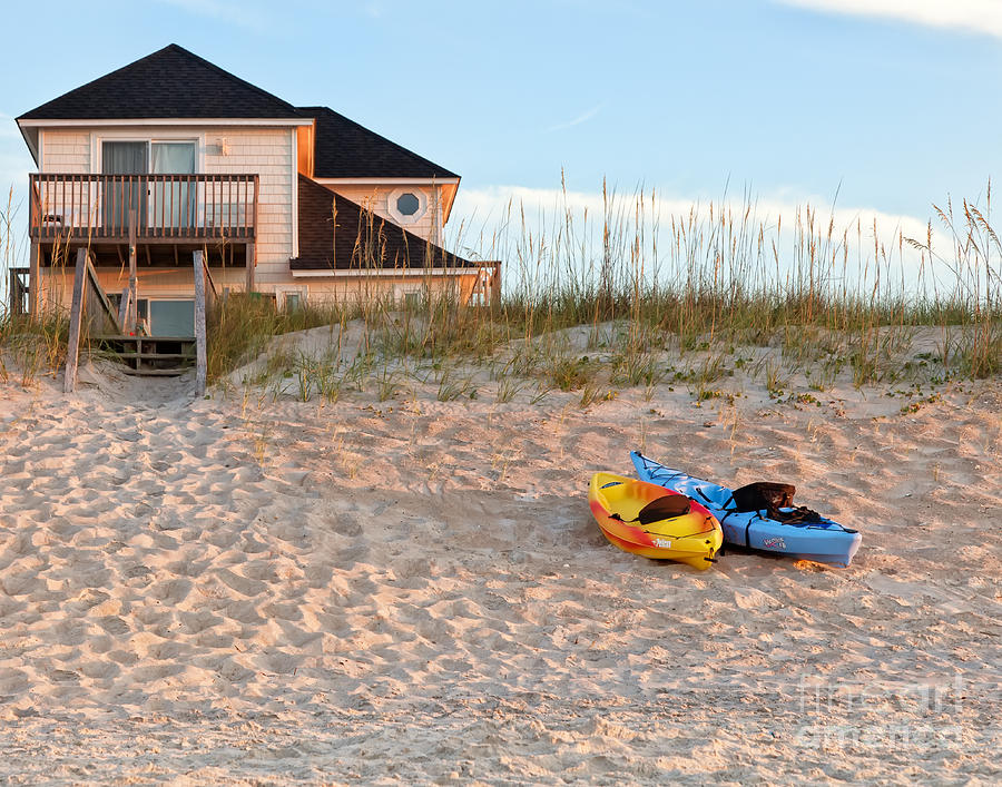 Kayaks Rest On Sand Dune In Morning Sun. Photograph by Jo Ann Tomaselli