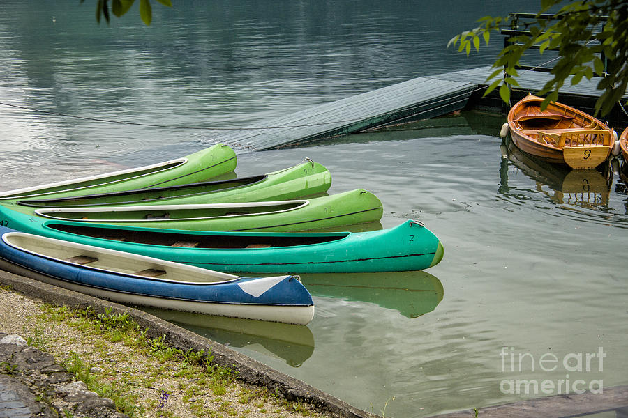 Kayaks In Slovenia Photograph by Timothy Hacker