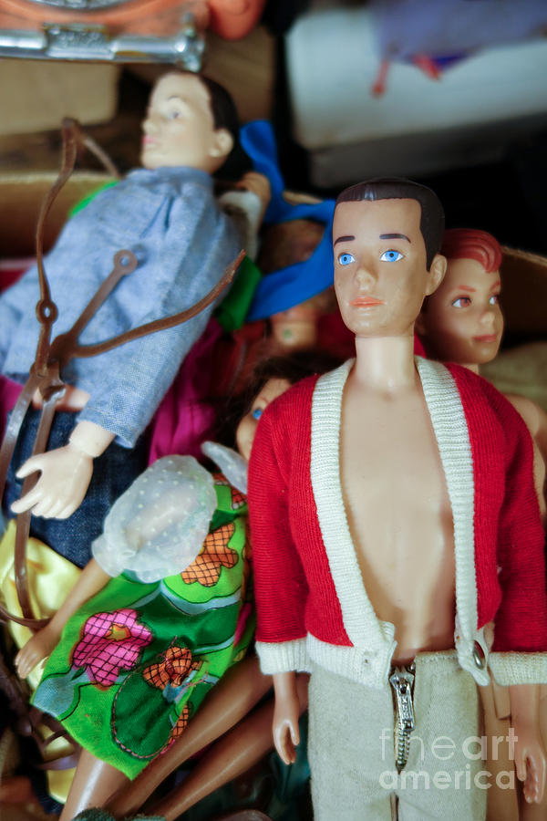 Vintage Photograph - Ken doll amidst other vintage Barbie dolls by Amy Cicconi