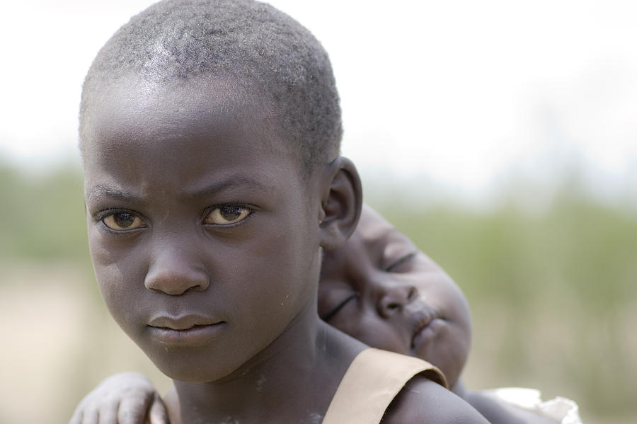 Kenyan girl with Infant Photograph by Clayton Lachance - Fine Art America