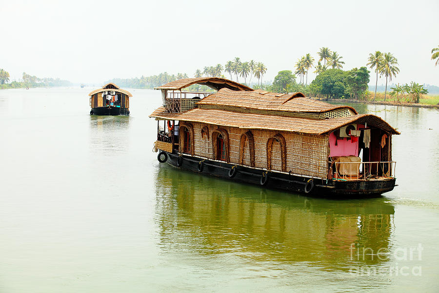 Kerala houseboats Photograph by Paul Cowan