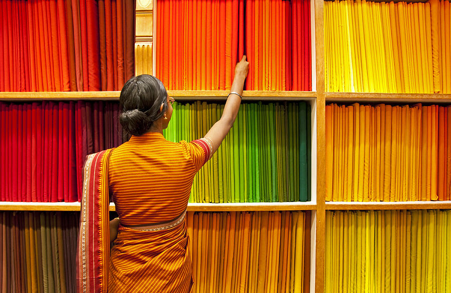 Kerala silk selection Photograph by Dennis Cox