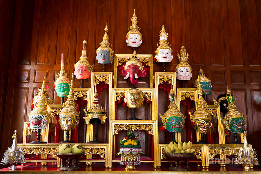 Buddha Photograph - Khon Masks is situated on the set of altar table by Tosporn Preede