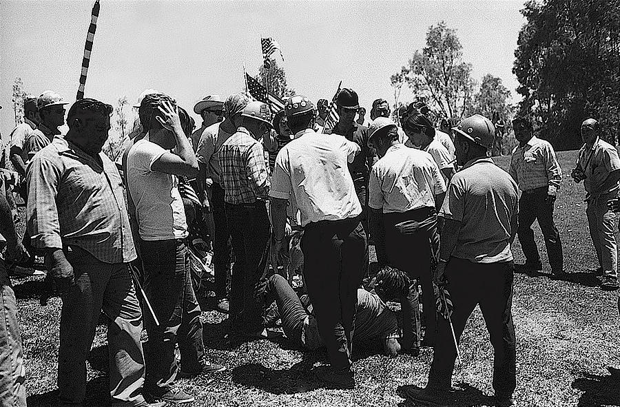 Kicking stomping anti-Viet Nam War protestor pro-war march Tucson Arizona 1970 black and white Photograph by David Lee Guss