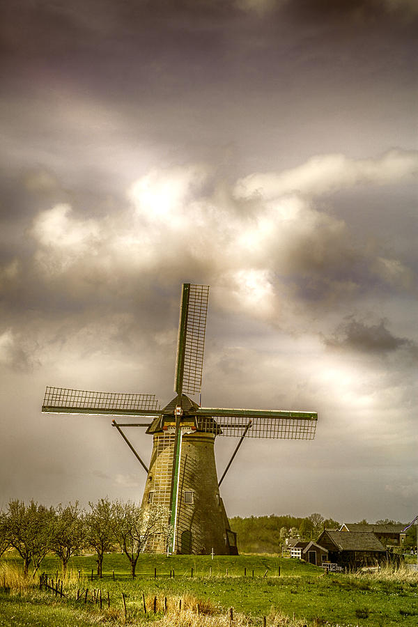 Kinderdijk Windmill Holland Photograph by James Bethanis