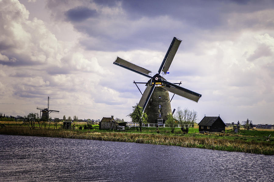 Kinderdijk Windmills Photograph by James Bethanis
