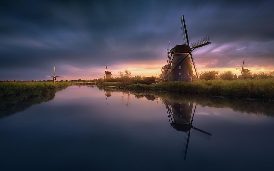 Sunset Photograph - Kinderdijk Windmills by Jes?s M. Garc?a