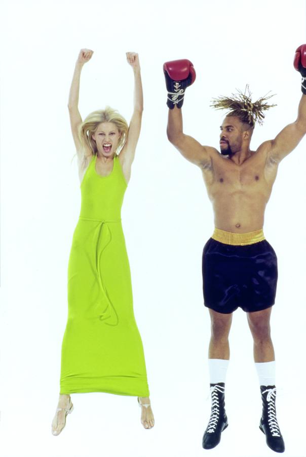 Kirsty Hume Jumps With Boxer Shannon Briggs Photograph by Arthur Elgort