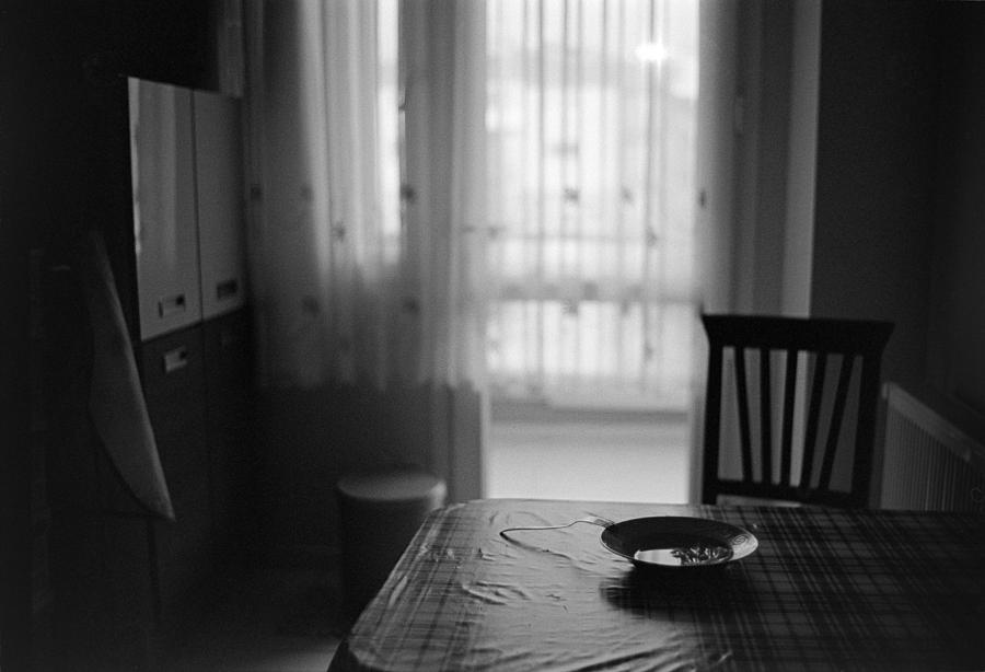 Black And White Photograph - Kitchen Table by Ilker Goksen