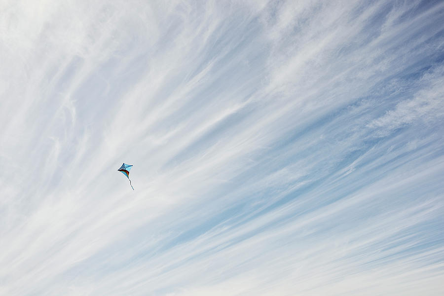 Kite In A Streaky Blue Sky Photograph by David Malan