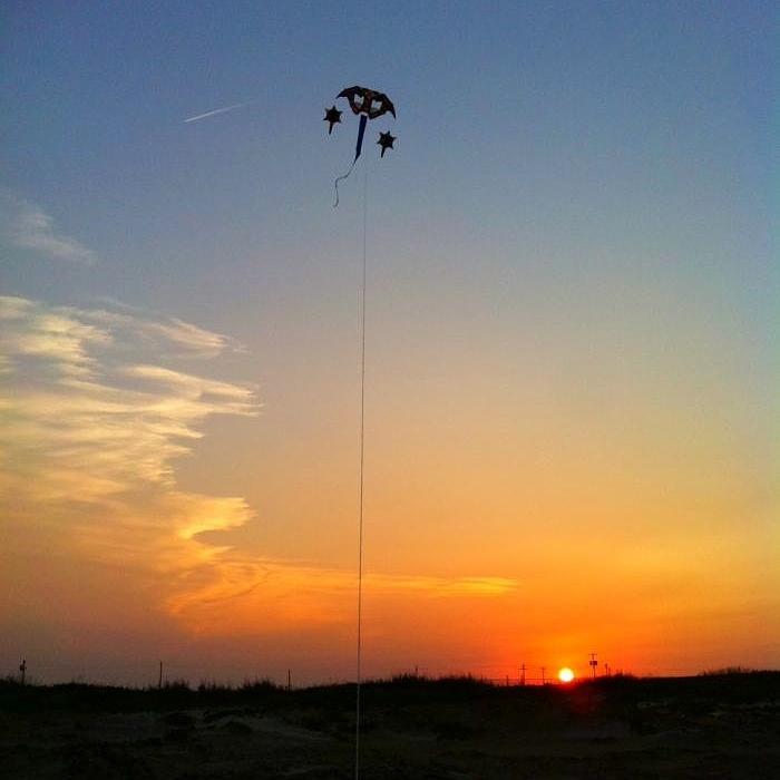 Kite In The Sunset Photograph by Brett Geyer