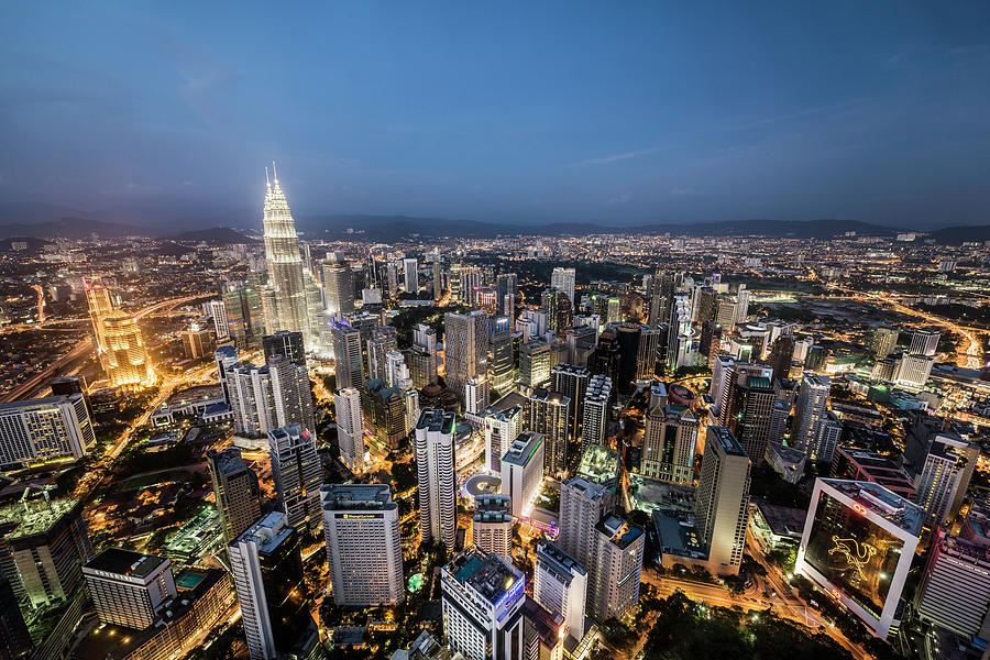 Kuala Lumpur Skyline At Dusk,elevated Photograph by Martin Puddy