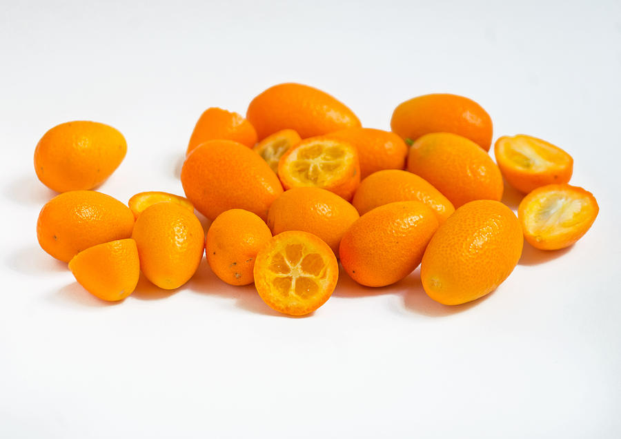 Kumquats, halved Photograph by CreatiVegan.net