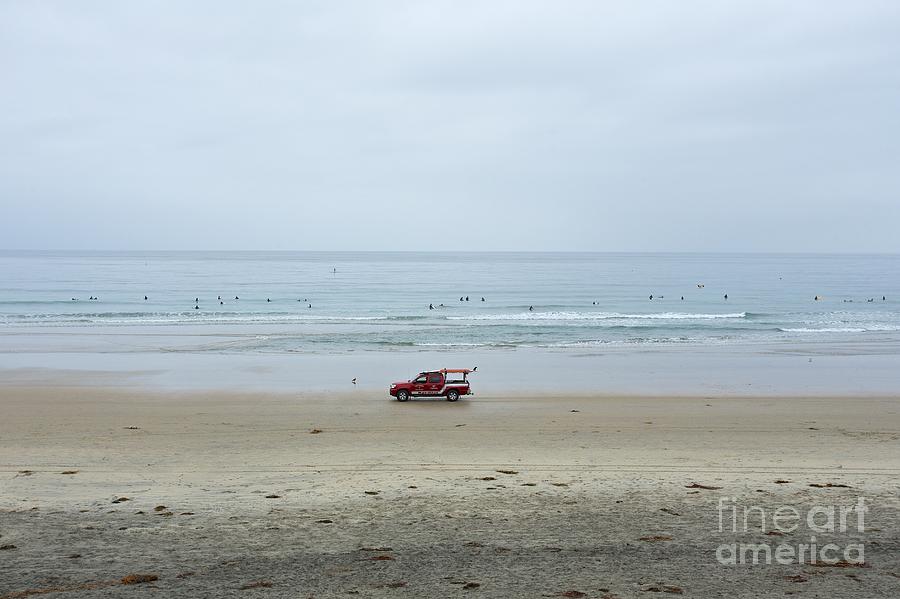 San Diego Photograph - Surfers on a Beach in La Jolla California by Mel Ashar