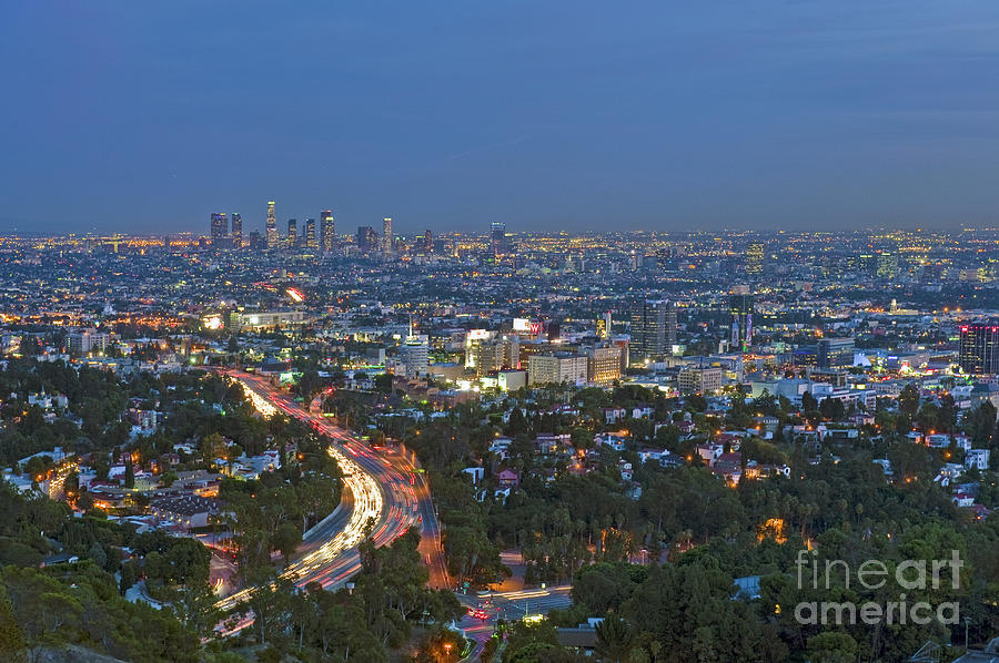 LA Skyline at night car tail lights streaking on 101 Freeway Photograph by David Zanzinger