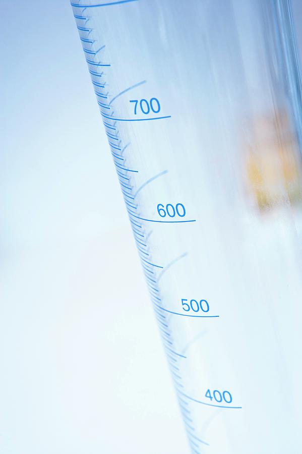 Laboratory Measuring Cylinder Photograph by Gustoimages/science Photo Library