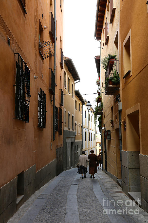 Strolling in Segovia Photograph by Carol Groenen