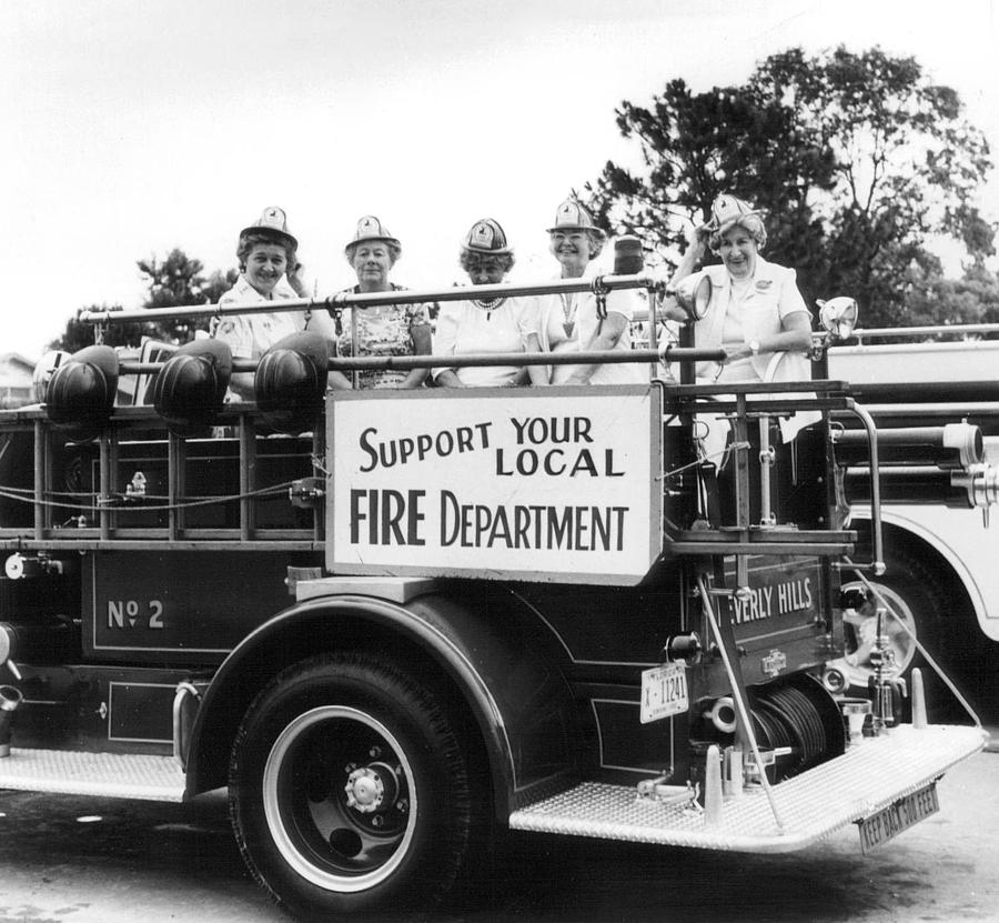 Vintage Photograph - Ladies supporting fire department by Retro Images Archive