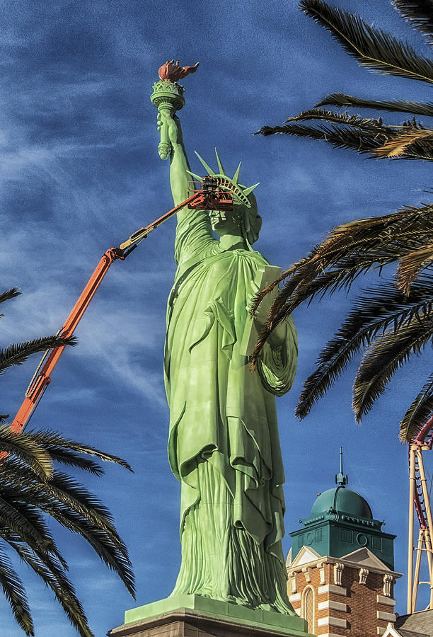 Lady Liberty gets a face  lift Photograph by Gary Warnimont