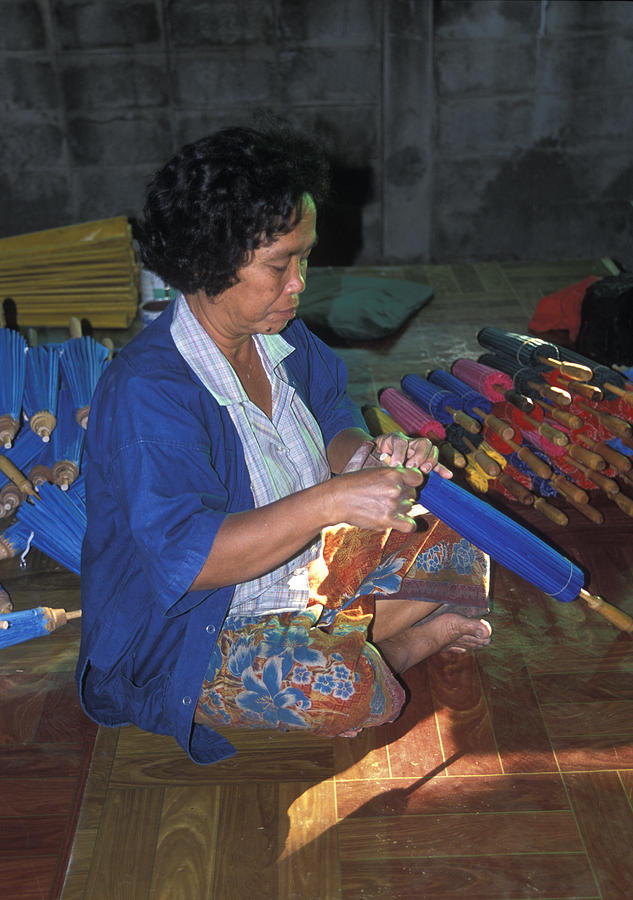 Umbrella Photograph - Lady makes umbrellas at a factory near Chaing Mai by Richard Berry Umbrella Photograph - Lady makes umbrellas at a factory near Chaing Mai by Richard Berry