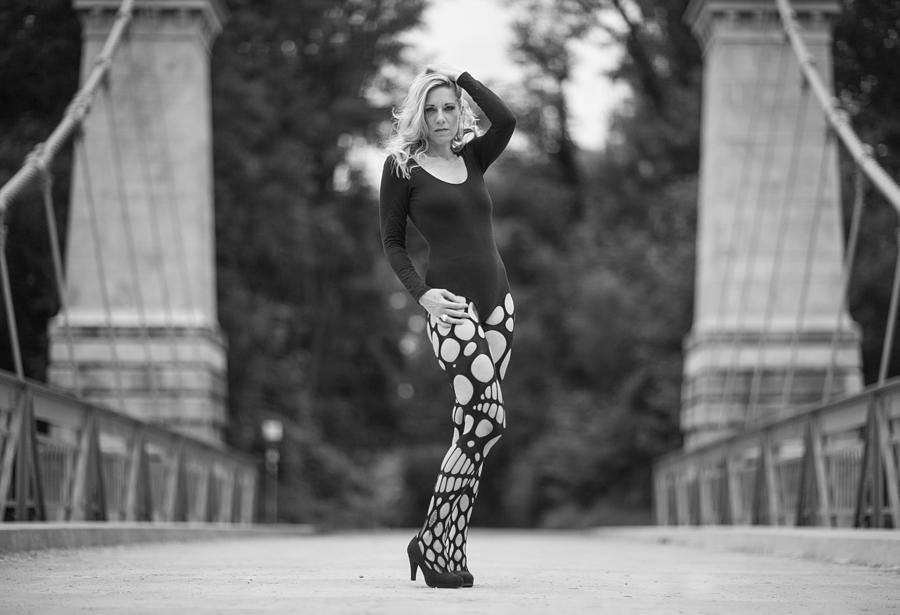 Black And White Photograph - Lady On A Bridge by Ralf Kaiser