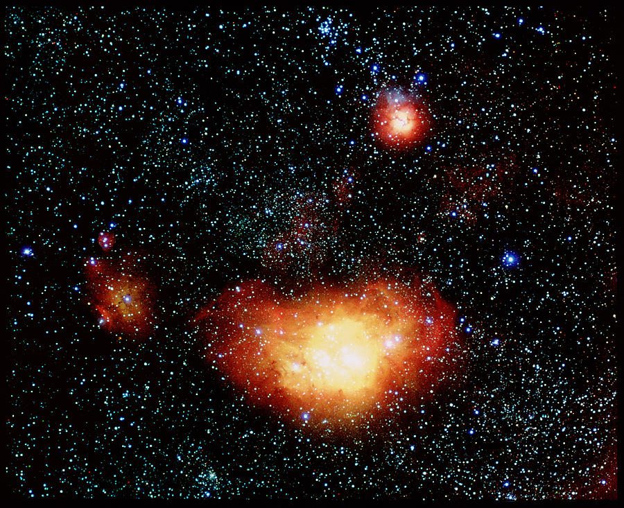 Lagoon And Trifida Nebulae Photograph by Mount Stromlo And Siding Spring Observatories/science Photo Library