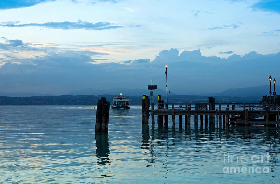 Summer Photograph - Lake Garda Pier and the Last Ferry for the day by Kiril Stanchev