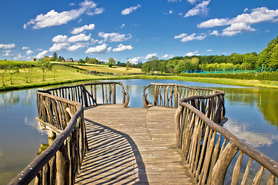 Lake in green nature wooden boardwalk Photograph by Brch Photography