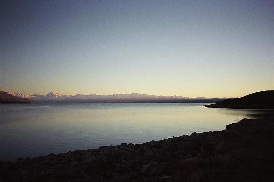 Mountain Photograph - Lake Pukaki First Light by Peter Mooyman