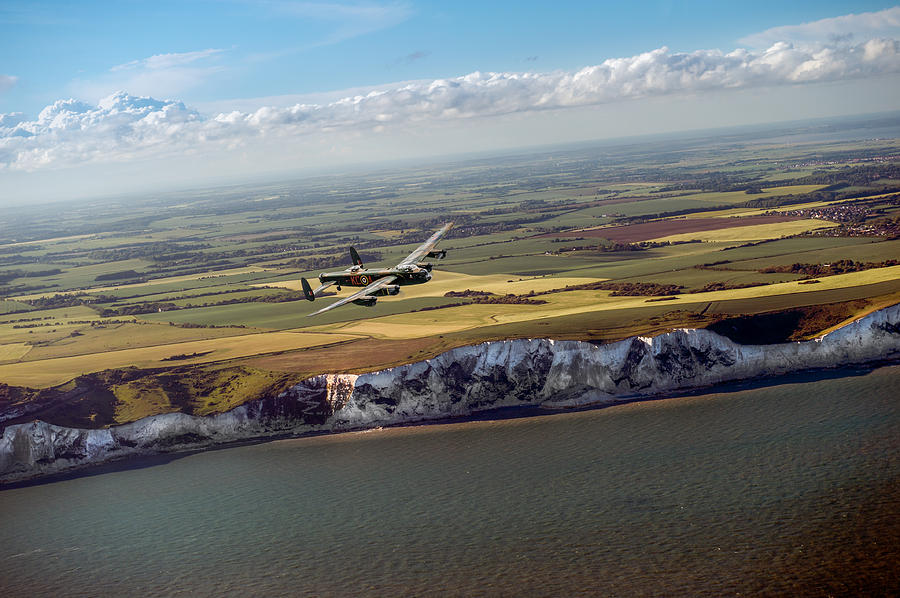 Lancaster over the white cliffs in Kent Photograph by Gary Eason