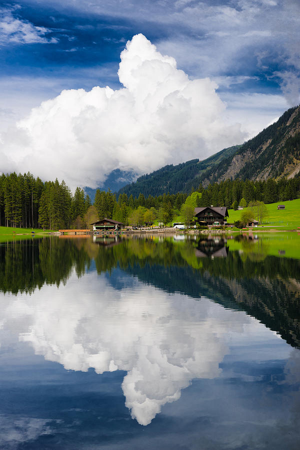 Landscape and cloud water reflection Austria Photograph by Matthias Hauser