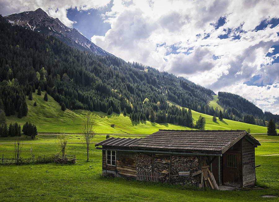 Landscape with barn in the alps with beautiful light Photograph by Matthias Hauser