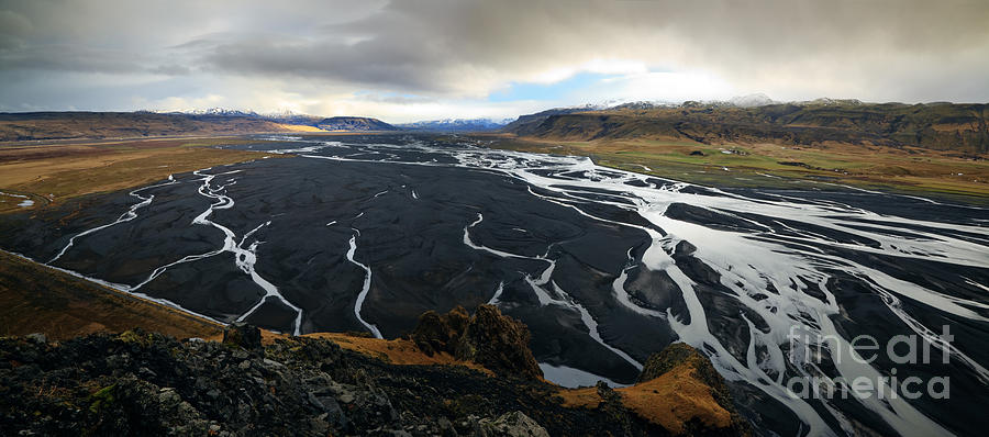 Nature Photograph - Landscape with river going down from mountain range in Iceland by Matteo Colombo