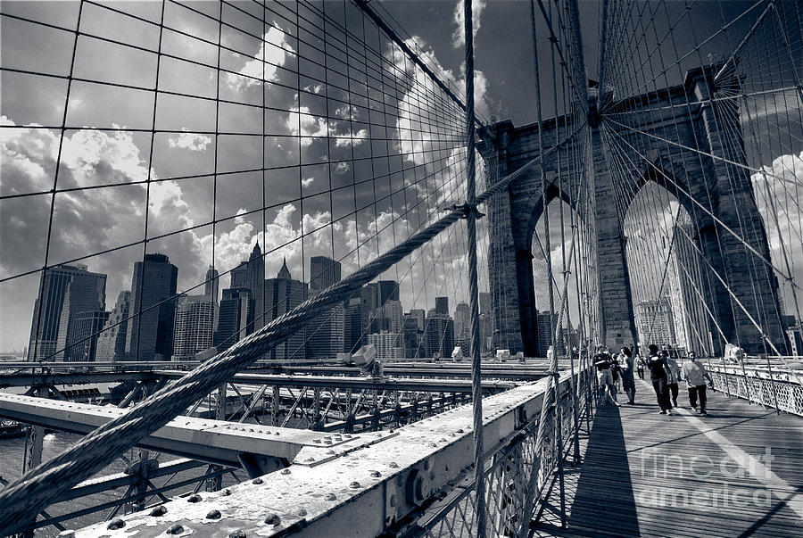 Black And White Photograph - Lanes for pedestrian and bicycle traffic on the Brooklyn Bridge by Amy Cicconi
