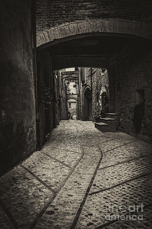 Laneway in Montefalco Photograph by Paul and Helen Woodford