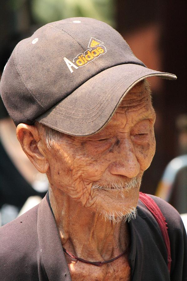 Lao man Photograph by Niels Photography - Fine Art America