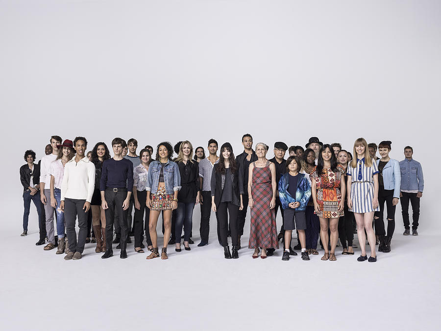 Large Group of people standing together in studio Photograph by Nisian Hughes