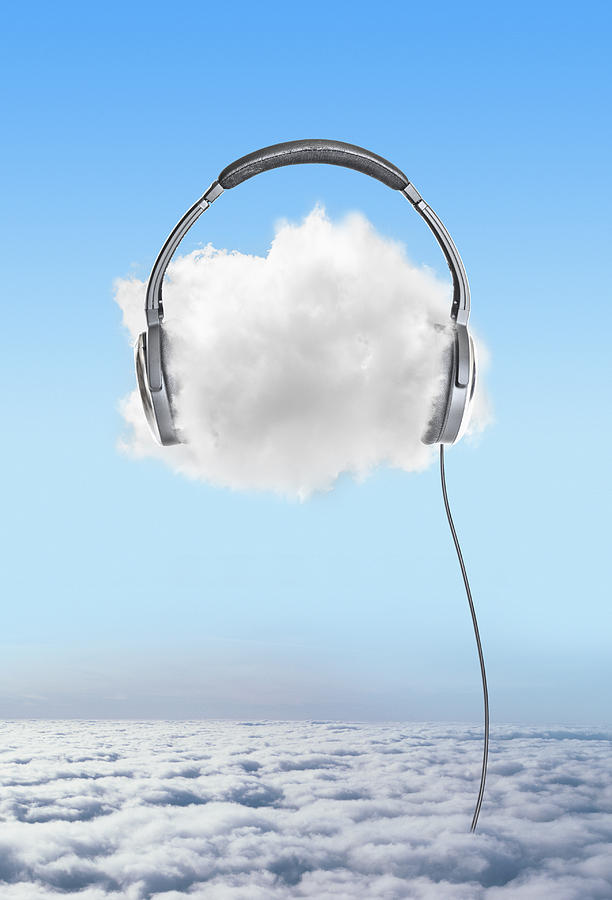 Large headphones on cloud in sky Photograph by Jon Feingersh Photography Inc