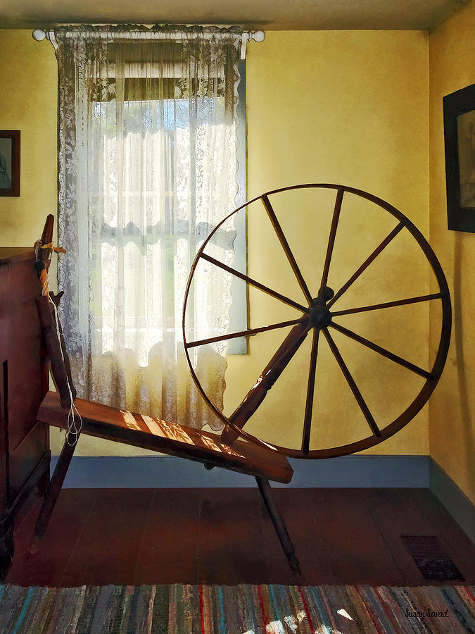 Large Spinning Wheel Near Lace Curtain Photograph by Susan Savad