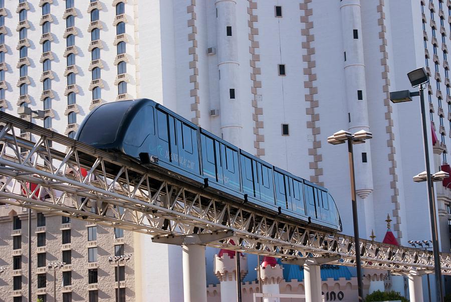 Las Vegas Monorail And Excalibur Hotel Photograph by Mark Williamson/science Photo Library