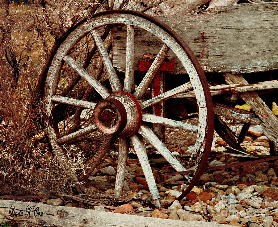 Last Load Wagon Wheel Photograph by Linda Cox