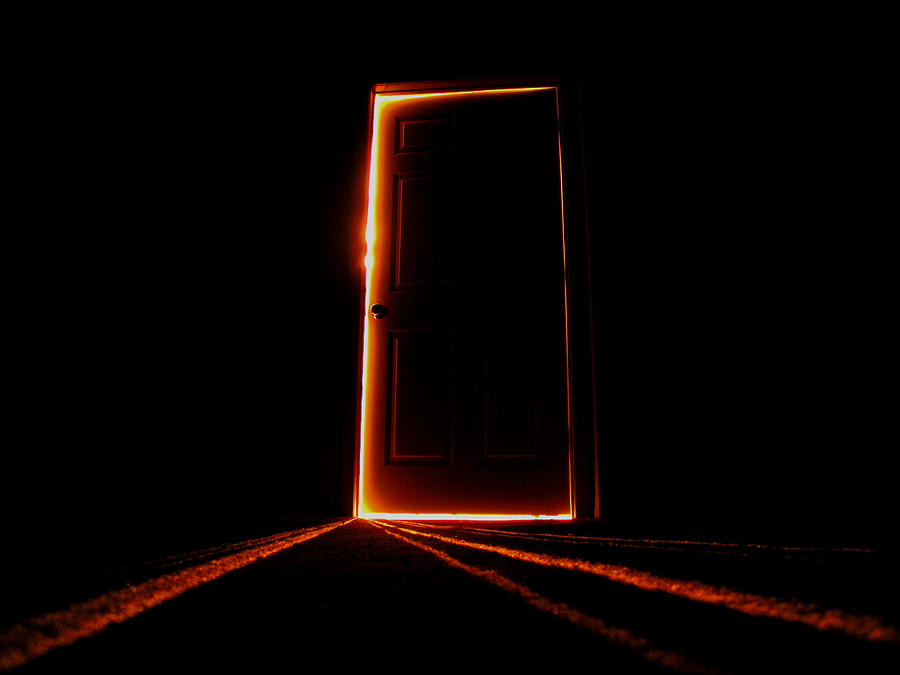 Late night image of a slightly open door Photograph by ToddSm66