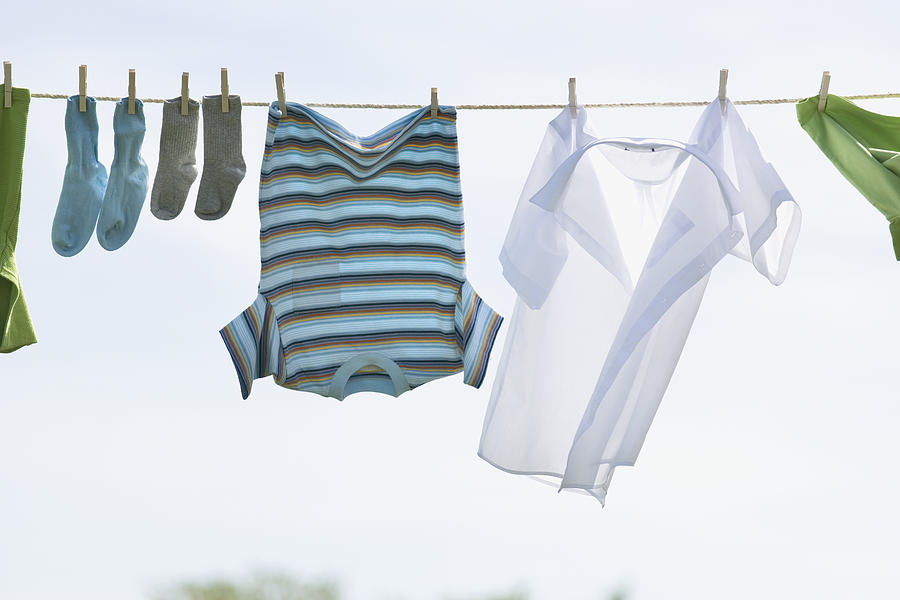 Laundry Hanging On Outdoor Clothesline Photograph by Bruno Crescia ...