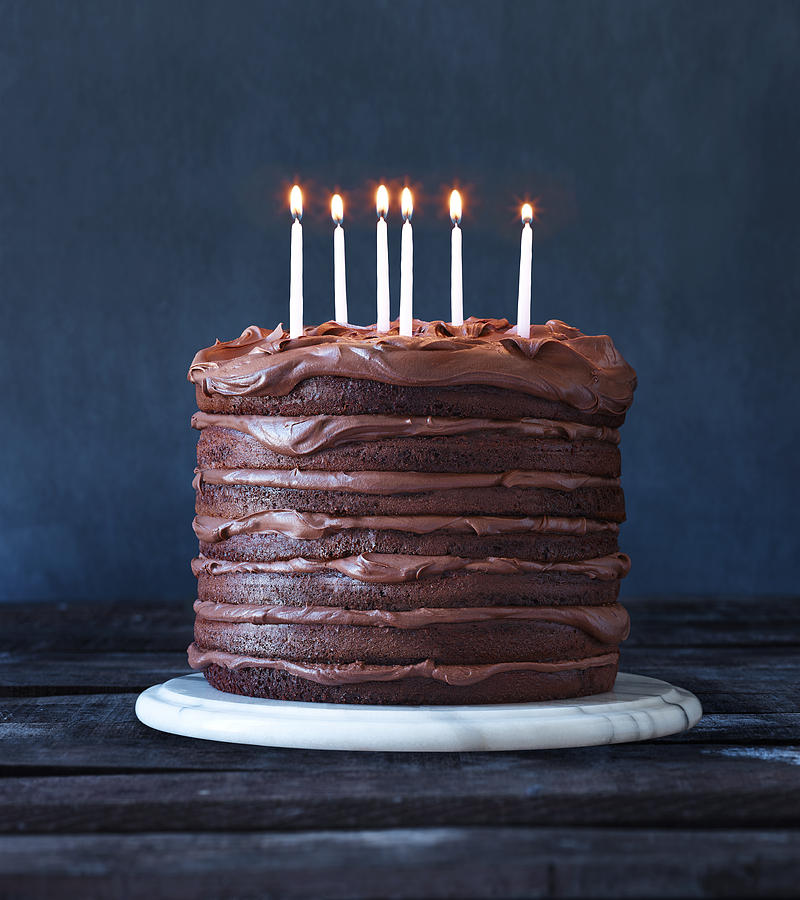 Layered Chocolate Birthday Cake with Candles Photograph by Annabelle Breakey