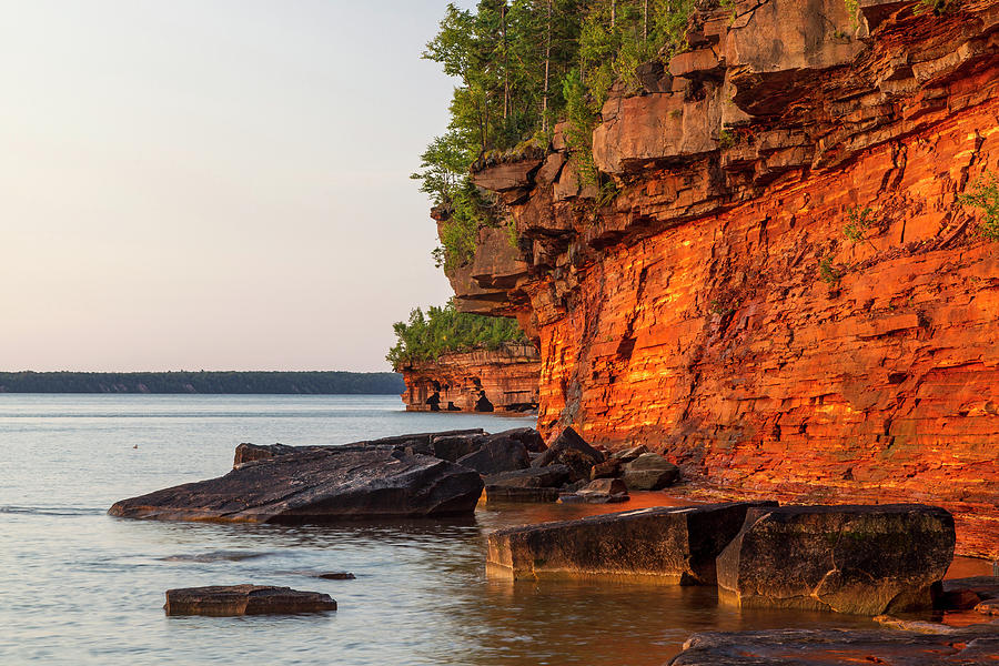 Layered Sandstone Cliffs And Sea Caves Photograph by Chuck Haney - Fine ...