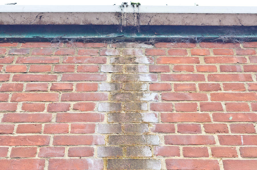 Architecture Photograph - Leaking gutter by Tom Gowanlock