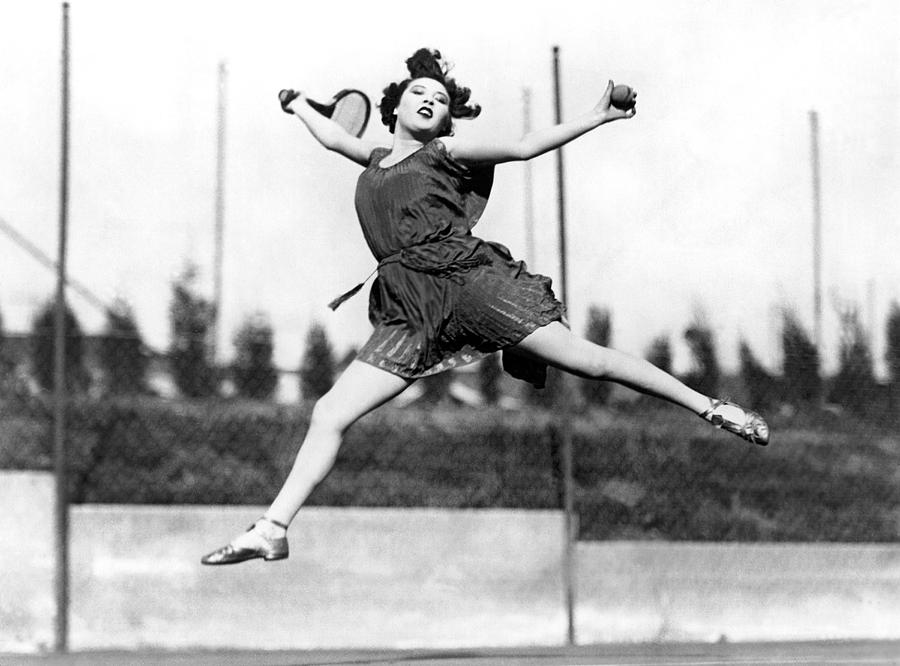 Leaping Tennis Woman Photograph by Underwood Archives