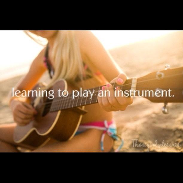 Love Photograph - Learning To Play An Instrument- Im by Courtney Whetton