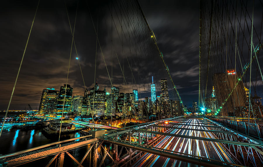 Leaving New York City via the Brooklyn Bridge Photograph by David Morefield